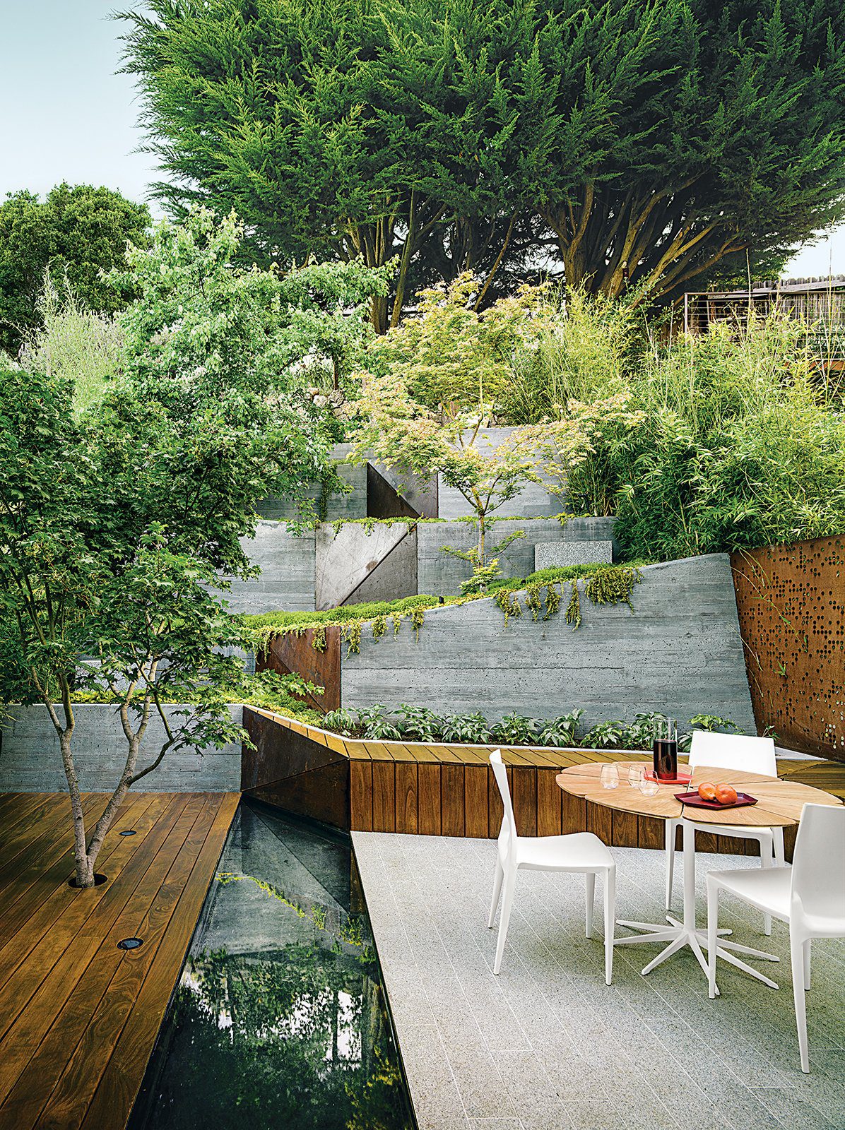 Mary Barensfield artchitecture design of an outdoor patio utilizing natural elements for materiality in architecture