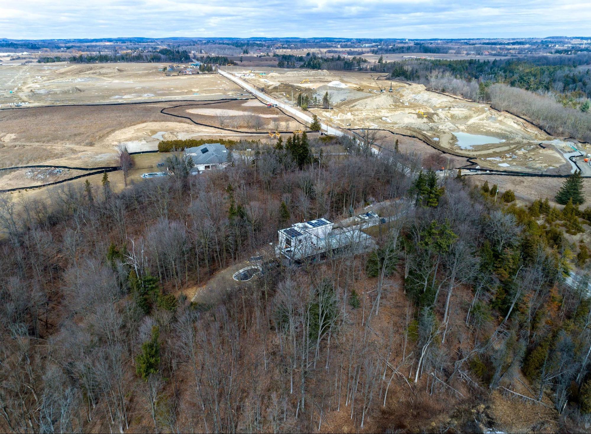 A large TRCA regulated property with vast trees and containing a custom home built by FrankFranco Architects. Finding the right lot is an important step to building a house in Ontario.