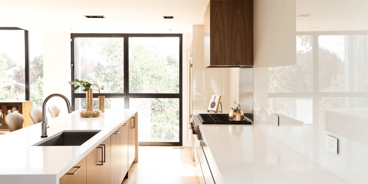 bright kitchen filled with natural lighting designed by FrankFranco Architects on their Deja View project. Find out more interior lighting design tips in our post!